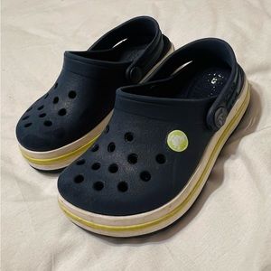 Toddler 7 Crocband Crocs navy and yellow gently used